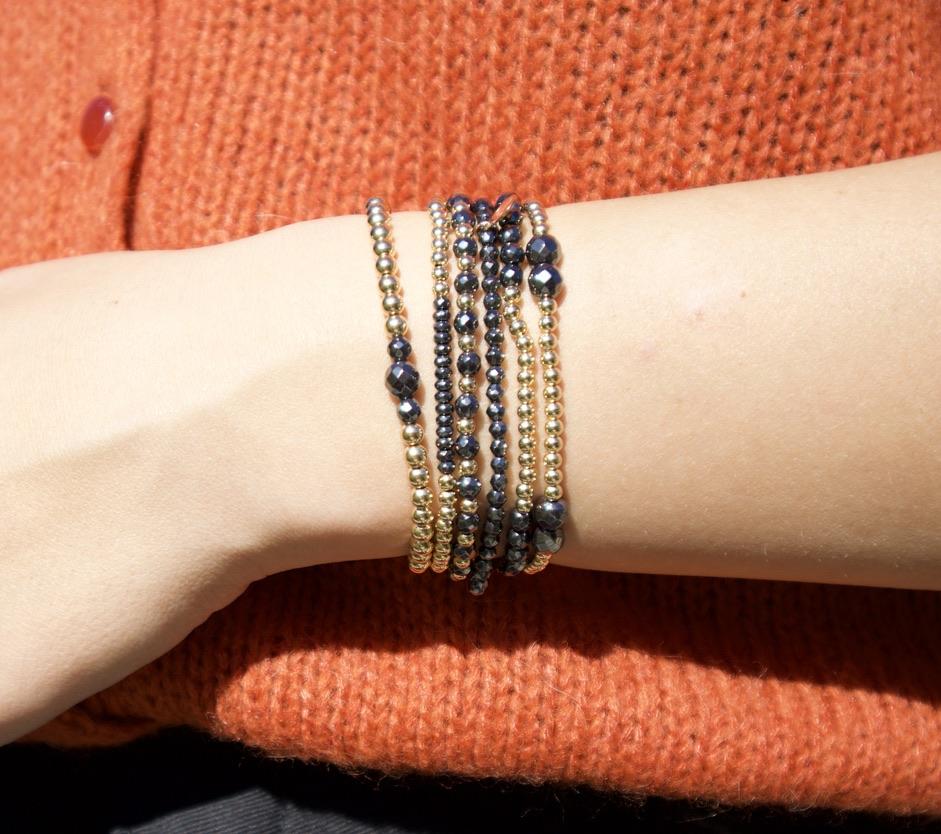 SEIDLALM ARMBAND HÄMATIT GRAU QUARTZ MIX GOLDFARBIGEN PERLEN