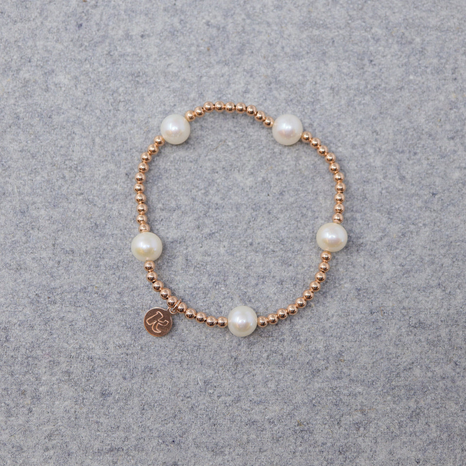 Rosévergoldetes Perlen Armband mit 5 Perlen "Pengelstein"